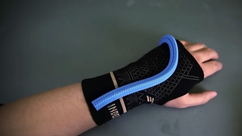A medical wrist sleeve using a 3D printed Y-zipper to add rigidity to the flexible sleeve material.