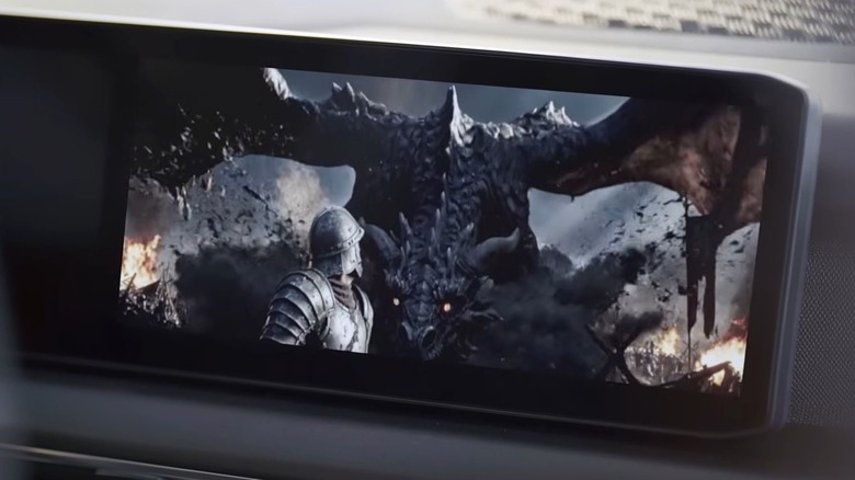 Google Android Auto screen YouTube with dragon scene onscreen.