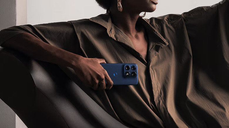 A person holding the Motorola Edge 70 Pro phone