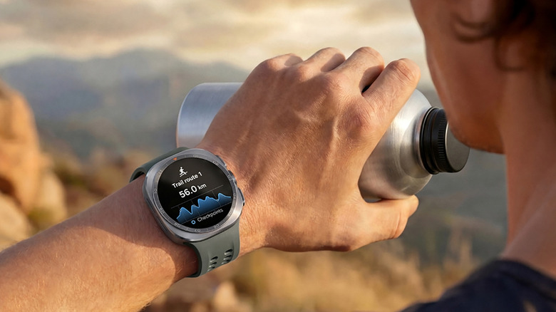 A man hiking and looking at a trail route on the Samsung Galaxy Watch Ultra 2.