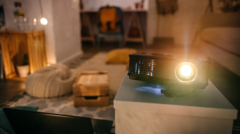 A home projector installed in an open area