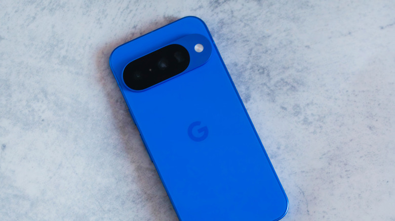 A Google Pixel 10 phone in Indigo color