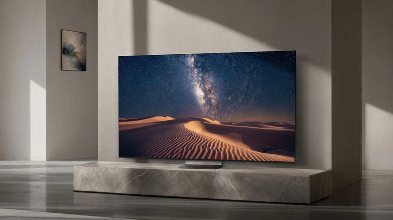 The Samsung R95H sitting on a marble shelf above gray flooring.