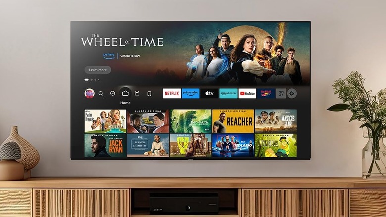 The Panasonic Z85 mounted in a modern living room above a TV stand.