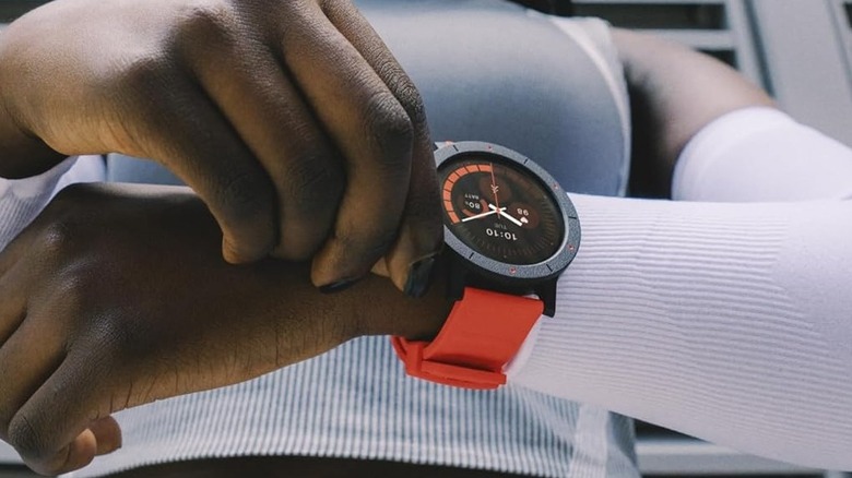 A person wearing the CMF Watch 3 Pro on their wrist