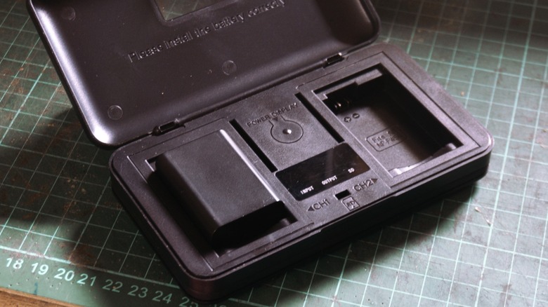 camera batteries placed in a charging case