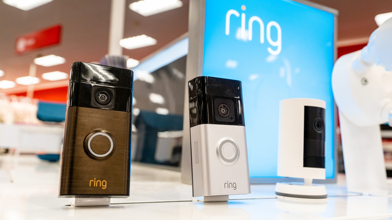 Three Ring video doorbells displayed at a retail outlet.