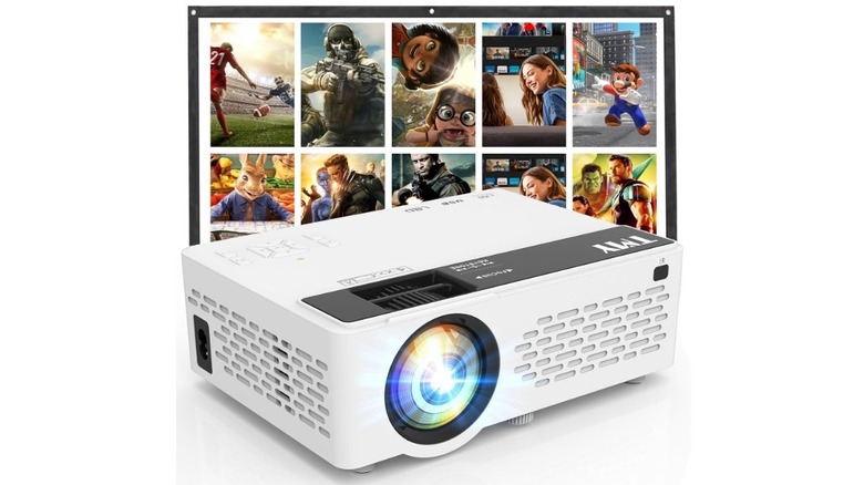 A TMY portable mini projector with media content on a screen in the background.