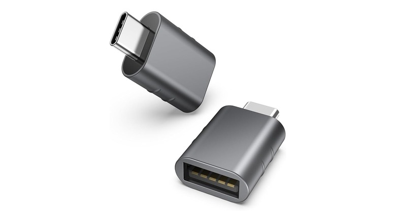 Two Syntech USB-A to USB-C adapters, which are small and black