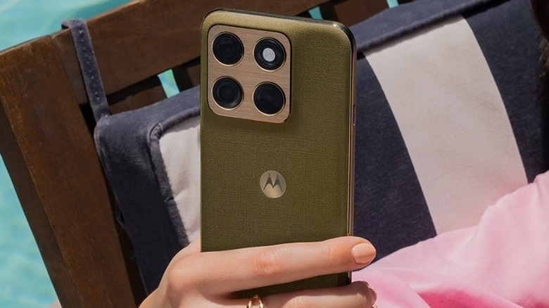 Close-up of a person holding the Motorola Edge (2026)