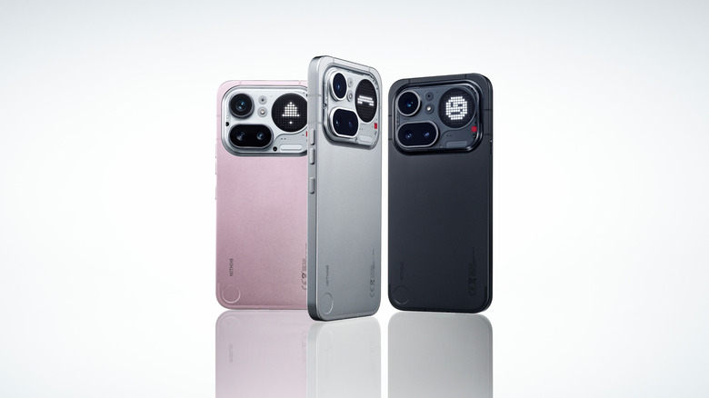 The Nothing Phone 4a Pro in its three color option against a grey background