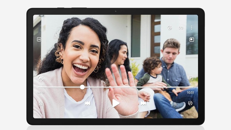 Galaxy tab A9+ on with a family taking a selfie using the front camera