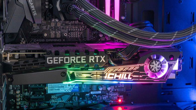 Nvidia GeForce RTX 3080 graphics card installed in a gaming PC with RGB lighting