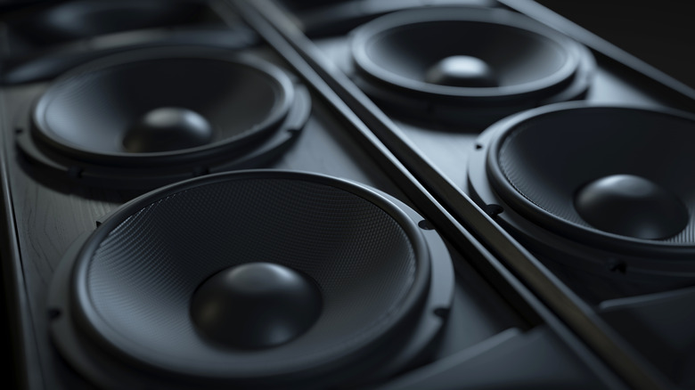 A close up of rendered black speakers in 3D