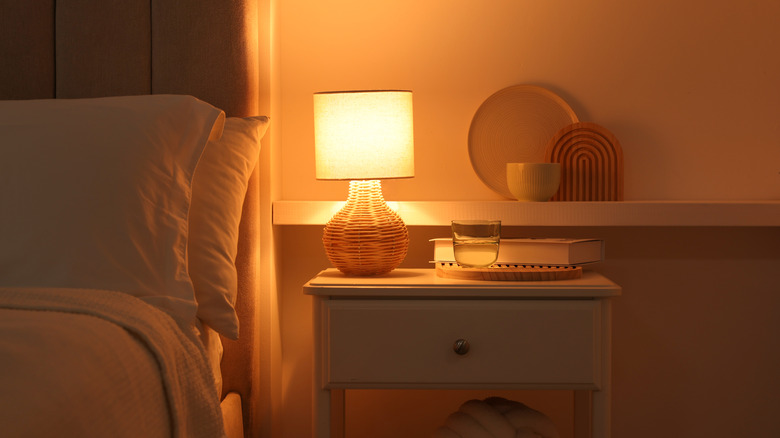 lamp placed on a nightstand in the bedroom