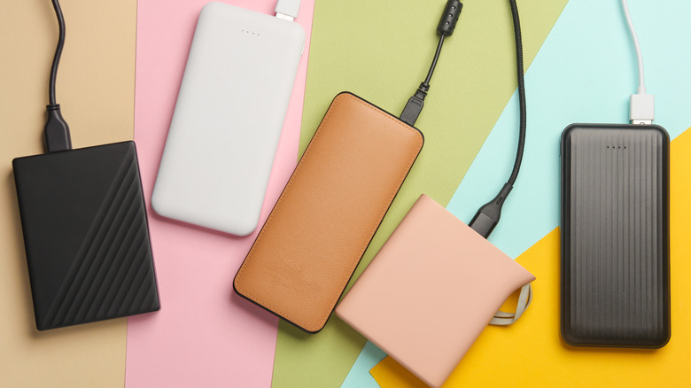 Different power banks on a colored pastel background