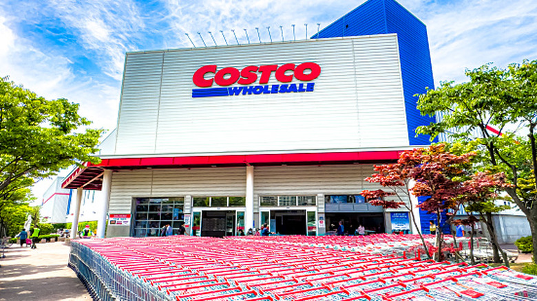 Shopping carts lined up in front of a Costco store