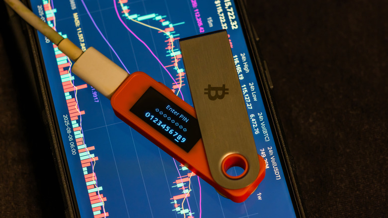 A hardware security key on a smartphone screen