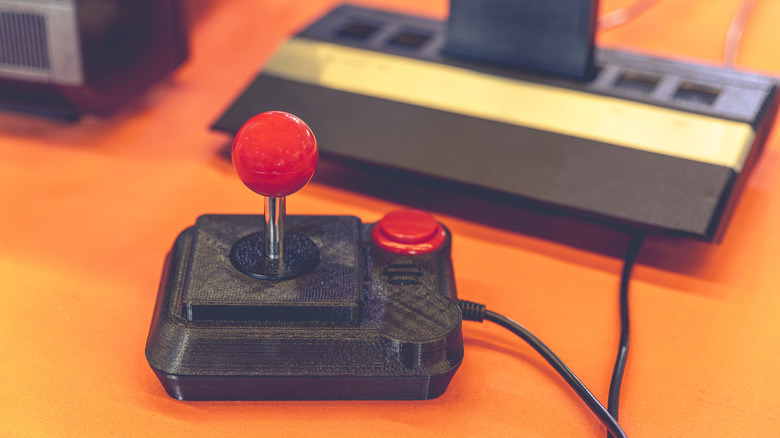 Vintage joystick controller with red button