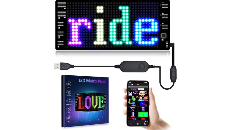 An Amazon promotional photo for the GOTUS LED Light Sign, the image showcases the sign and its USB powercable, alongside a cellphone displaying the accompanying app as well as the box for the product