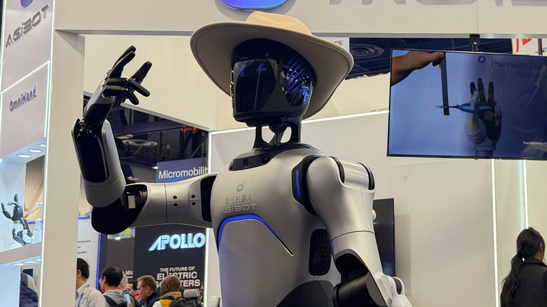 Agibot A2 humanoid robot wearing a hat and posing for a picture