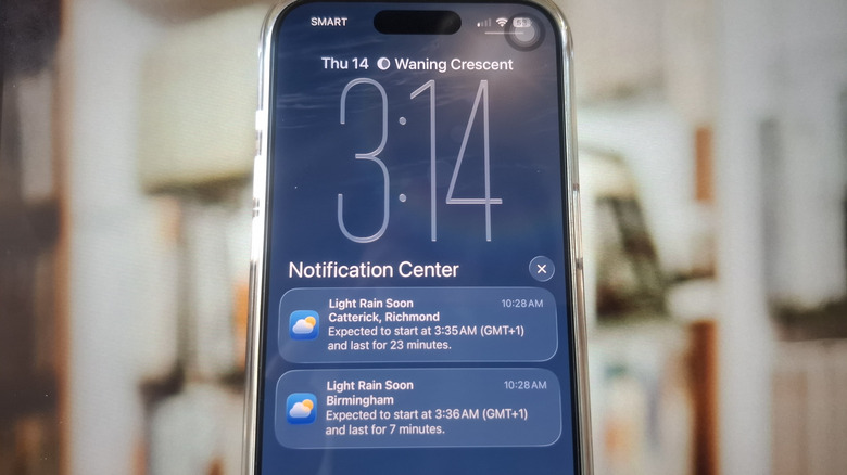 The iPhone Weather app displaying rain notifications