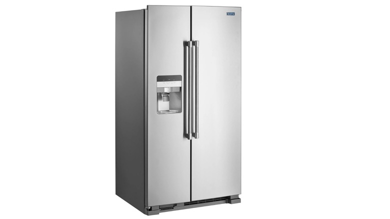 A silver two-door Maytag MSS25C4MGZ refrigerator set against a white background