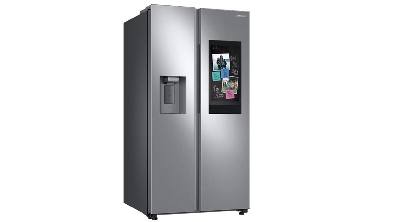 The Samsung 26.7 cu. ft. Large Capacity Side by Side Refrigerator with Family Hub on a white background.