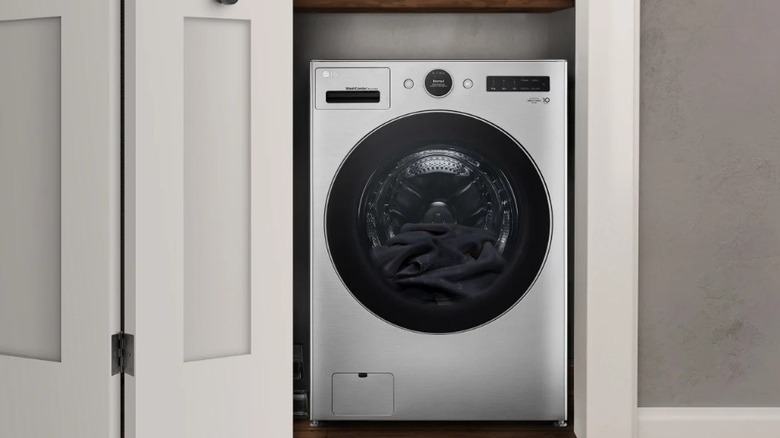 The LG 5.0 cu. ft. Mega Capacity Smart Wash Combo All-in-One Washer/Dryer with Inverter HeatPump Technology in the laundry room.