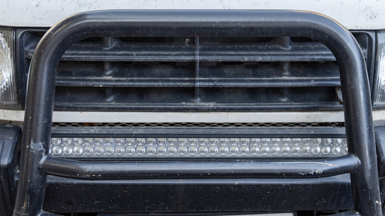 Close up of a truck with a bull bar installed on the front