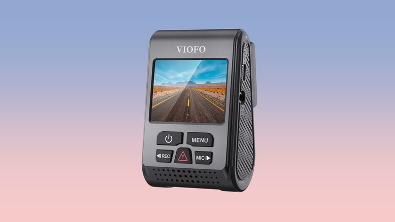 Viofo A119 V3 dash cam against a gradient background