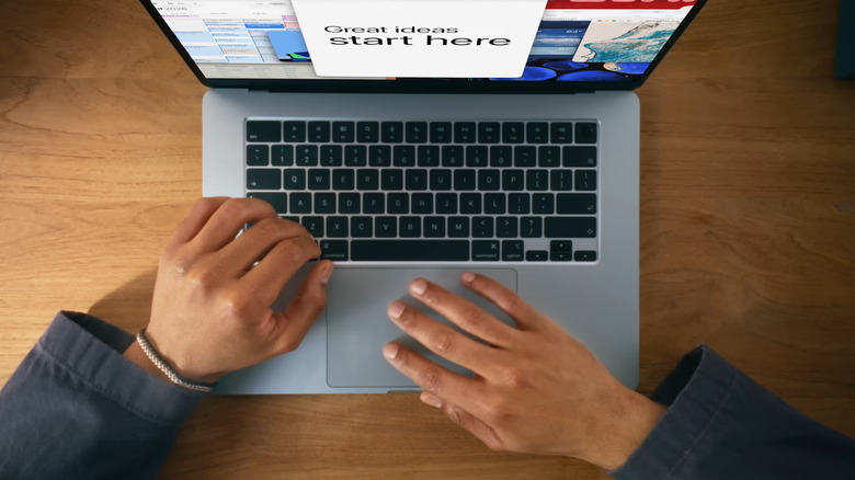 Hands using keyboard on MacBook Air
