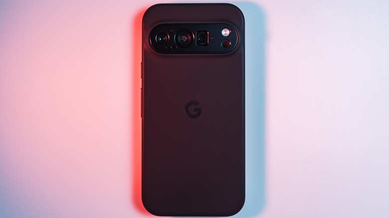 A Google Pixel 10 Pro laying on the front showing the back with the logo