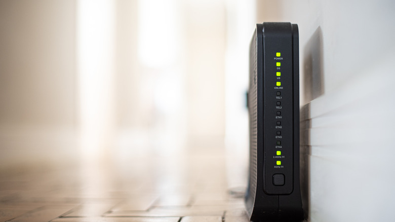 bad router placement concept, router on floor in hallway