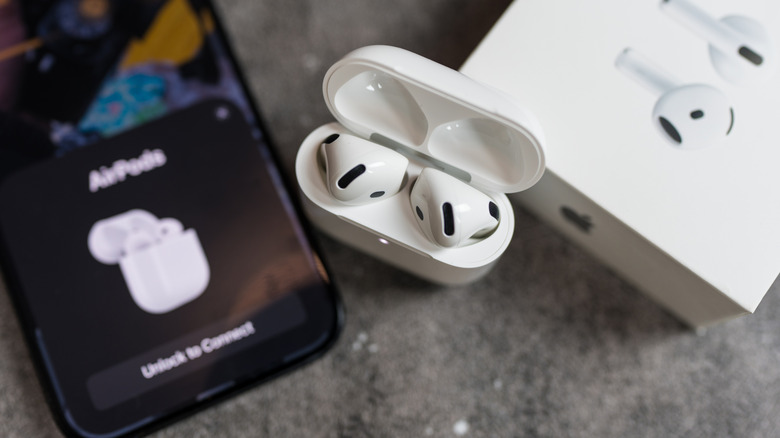 earbuds trying to pair with smartphone
