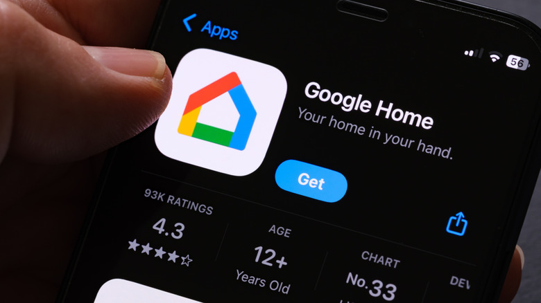 Close-up of phone with Google Home app featured in app marketplace