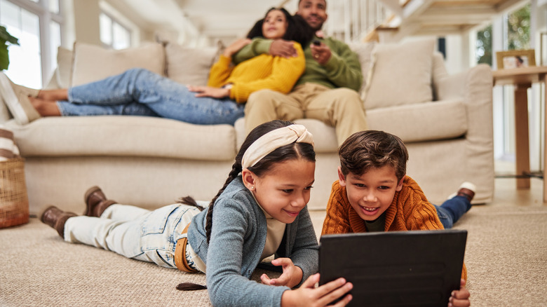 Family using their devices on a high-speed home network.