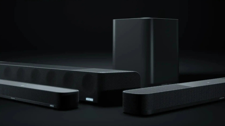 A collection of Sennheiser soundbars and a subwoofer.
