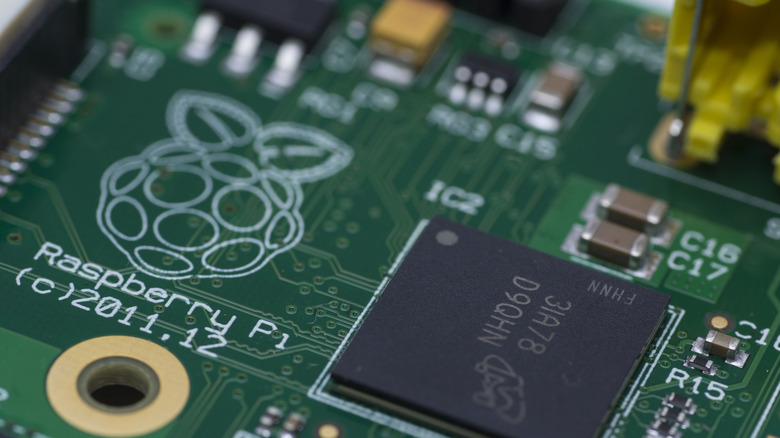 Raspberry Pi logo on a motherboard