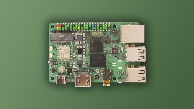 Radxa Dragon Q6A on green background