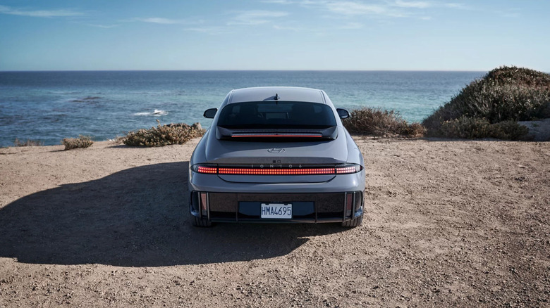 A Hyundai IONIQ 6 parked at the ocean