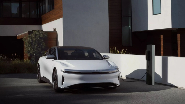 A Lucid Air connected to a charging station