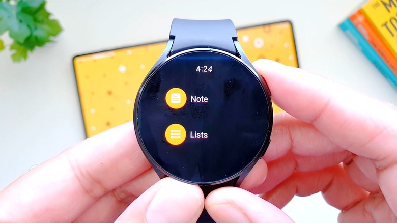 Android smartwatch displaying Google Keep options to create a note or list