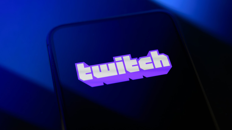 Twitch logo on a blue and black background