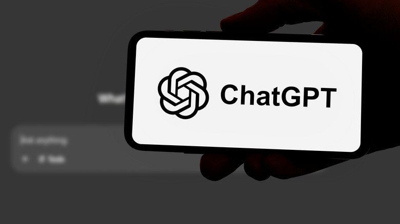 OpenAI's logo and the words ChatGPT on a smartphone.