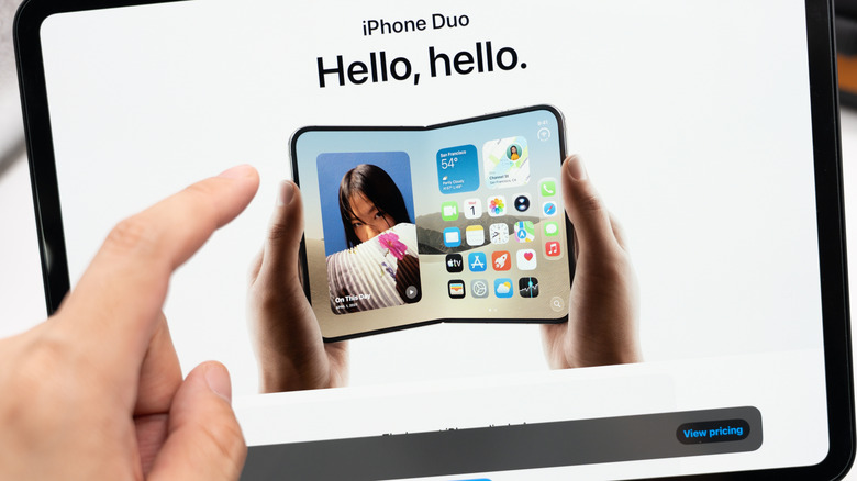 Person viewing the iPhone Duo page on a tablet screen