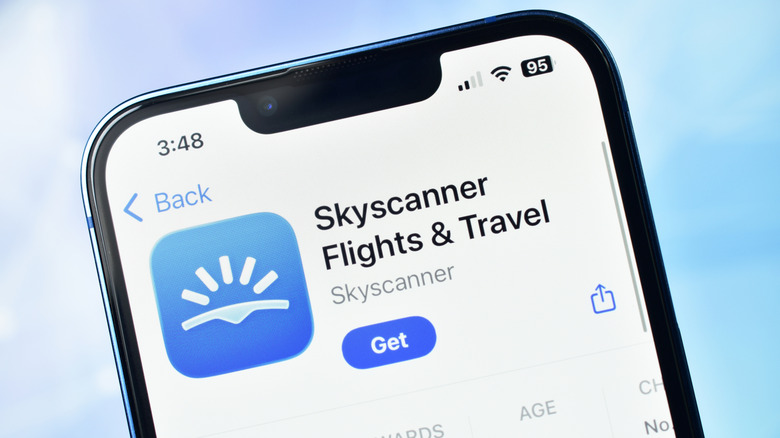 Skyscanner listing in Apple App Store on a smartphone screen