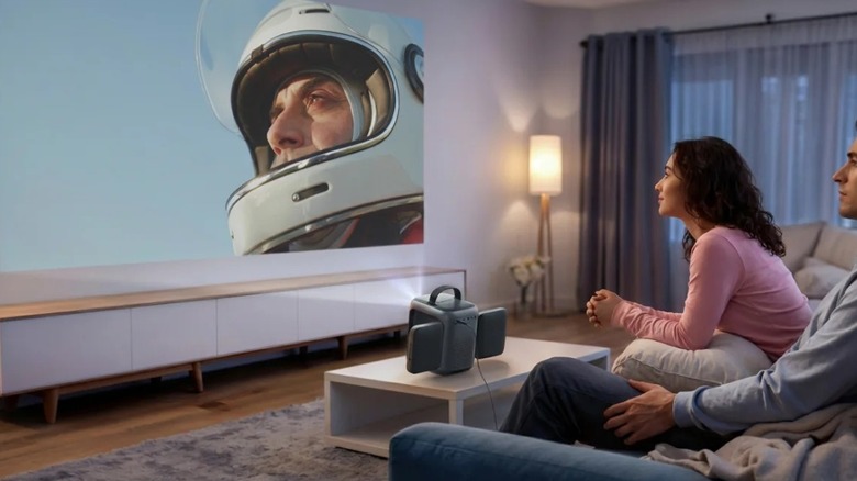 Man and woman watching movie in the living room using souncore Nebula P1i