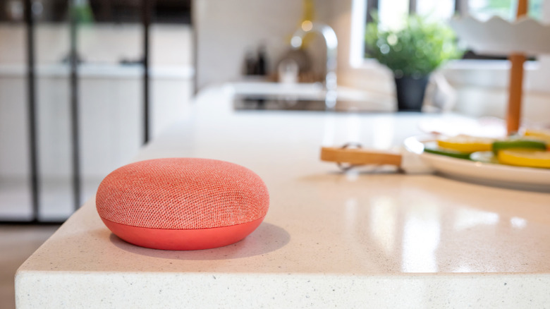 A  Google smart speaker in a bright kitchen
