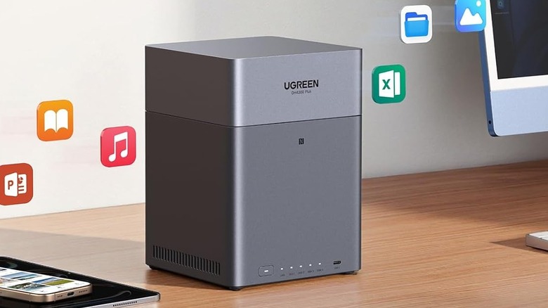 The UGREEN NAS DH4300 set up on a computer desk.